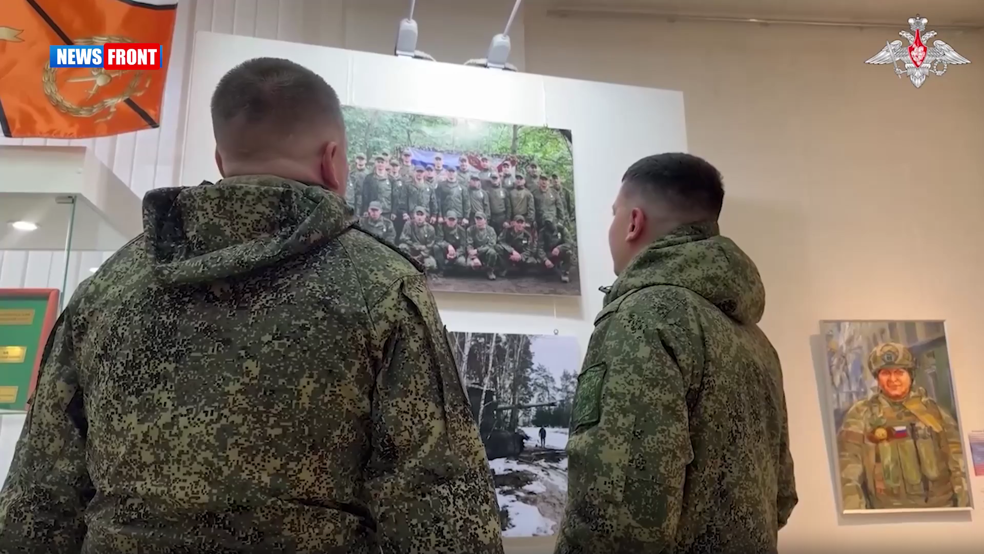 В Белгороде открылась выставка портретов военнослужащих 128‑й бригады художницы Елены Харламовой
